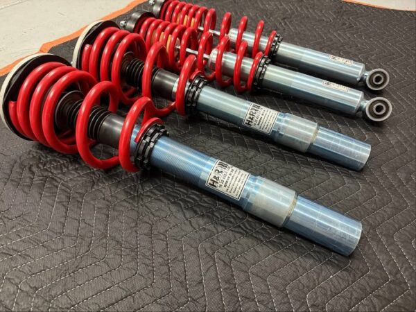For Sale BMW E39 H&R RSS coilovers Complete set of H&R RSS Coilovers including OE top mounts front and rear for BMW E39. These are complete and ready to bolt in. No need to disassemble existing units. Approximately 1500 miles on the clock; these are like new.  These have stainless inverted mono-tubes up front and stainless mono-tubes out back. They are height adjustable. Upper mounts/bearings are all OEM/OE and brand new. - Image 3