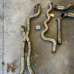 Active autowerkes equal length mid pipe and apex resonated down pipes with mini pipes approximately 2000 miles.  Active autowerkes mid pipe  Apex down pipes