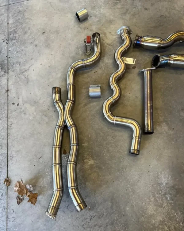 Active autowerkes equal length mid pipe and apex resonated down pipes with mini pipes approximately 2000 miles.  Active autowerkes mid pipe  Apex down pipes