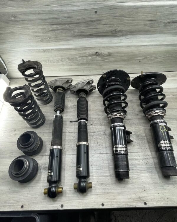F30 RWD 5 Bolt BC Coilovers One camber plate slightly bent. Can be easily repaired